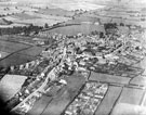 Aerial view of Woodhouse area and district. Sheffield Road in foreground leading to Chapel Street. Tannery Street in background, right. Stradbroke Road, left. Allotment gardens in foreground