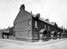 Nos. 27 etc. Don Road at junction of Sanderson Street, Sir Robert Hadfield's model cottages, built 1894, Edward Holmes, architect. Newhall County School, far left