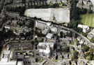 Aerial view of Broomhill area. Weston Park Hospital and the University Sports Ground being redeveloped, Whitham Road, centre, Northumberland Road and Western Bank, right. Tree Root Walk, centre. Royal Hallamshire Hospital, bottom, left 	