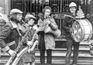View: s22873 Sheffield Street Band play on the Town Hall steps in aid of striking miners