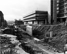 Construction of Furnival Square roundabout and underpass, Eyre Street showing Furnival House and multi storey car park and Nos.14/20 Savemore Discount Supermarket 