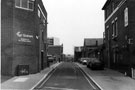 Graham, builders merchants, left looking down Arundel Lane with the part of the Red Lion public house, Charles Street right