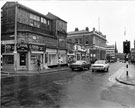 View: s23131 From the junction with Carver Street, Nos. 30 G. Yospa, jeweller; 26 - 28, Madame Marie (Milliners) Ltd.; 24, The Flower Kiosk; 22, Jeff's Curios and 20, J. Fantham, hairdressers, Division Street