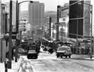 View: s23182 The Moor from Pinstone Street looking towards Lansdowne Flats showing Debenhams; Robert Brothers, Rockingham House and Nos. 78 - 82 John Atkinson Ltd., department store
