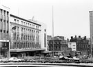 View: s23286 Waring and Gillow (former premises of Peter Robinson Ltd.), house furnishers, Nos. 51 - 57 and C and A Modes Ltd., Nos. 59 - 65 High Street from The Hole in the Road, Castle Square looking towards Commercial Street