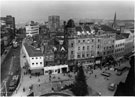 View: s23318 Elevated view of Fargate from the Town Hall looking towards Leopold Street showing premises including Nos. 70 H.L.Brown and Son Ltd., jewellers; Western Jean Company Ltd.; R.A. Millet Ltd. and No. 58 Burnley Building Society