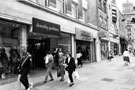 Nos. 33-35, Top Shop and Dorothy Perkins; 37, Thomas Cook Ltd., travel agent, Fargate looking towards Norfolk Row