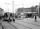 Supertram destined for Halfway, Castle Square Supertram stop showing GT News kiosk right