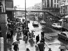 View: s23712 Rainy day in Haymarket looking towards the footbridge and Fitzalan Square with (right) the junction of King Street