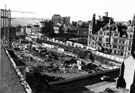 Construction of the Town Hall Extension (known as the Egg Box (Eggbox)), Surrey Street and Norfolk Street looking towards Furnival Gate with the Grosvenor House Hotel and Pinstone Street and Grosvin the background 