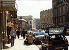 Surrey Street from Yorkshire Bank Chambers entrance looking towards No. 117 Hibbert Brothers, picture framers and fine art dealers; and Central Library with the Town Hall and Extension right Surrey Street from Yorkshire Bank Chambers entrance looking towards No. 117 Hibbert Brothers, picture framers and fine art dealers; and Central Library with the Town Hall and Extension right