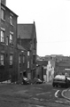 Bailey Street looking towards Broad Lane premises including St. James Sunday School (tall building centre) and No. 57, R. Boynton, accident repairs Bailey Street looking towards Broad Lane premises including St. James Sunday School (tall building centre) and No. 57, R. Boynton, accident repairs