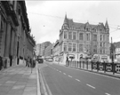 Supertram travelling towards the Cathedral Supertram stop, Church Street with the Gladstone Buildings right Supertram travelling towards the Cathedral Supertram stop, Church Street with the Gladstone Buildings right