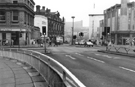 View: s23862 Junction of High Street; Haymarket (left); Fitzalan Square (right) and Commercial Street looking towards Yorkshire Bank; former Gas Company Offices (left); Barclays Bank and  Hyde Park Flats in the background