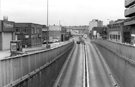 View: s23887 The Underpass, Eyre Street looking towards St. Mary's Gate with No. 1, Carpetland left and the junction with Duke Lane