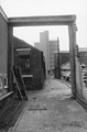 Furnival Lane looking across Eyre Lane from the yard of Wilkinson and Cuthbert Ltd., small tool manufacturers, No. 47 Eyre Lane with the rear of No.105 Eyre Street left