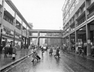 William Timpson Ltd., shoe and shoe repair shop (left); Castle Market Gallery and Castle Market (right), Exchange Street looking towards Castle Street