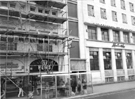 No. 8, Smiths Cleaners, dry cleaners and No. 6 G. T. News; The White Building during refurbishment and No. 4 The Marples Hotel (right), Fitzalan Square No. 8, Smiths Cleaners, dry cleaners and No. 6 G. T. News; The White Building during refurbishment and No. 4 The Marples Hotel (right), Fitzalan Square