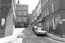 Figtree Lane from the junction with Queen Street looking towards Victoria Chambers; Harold Chambers and B. G. Balderson Estates, estate agents (right) with Belgrave House extreme left and Haxworth Chambers extereme right Figtree Lane from the junction with Queen Street looking towards Victoria Chambers; Harold Chambers and B. G. Balderson Estates, estate agents (right) with Belgrave House extreme left and Haxworth Chambers extereme right