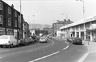 Nos. 199; 201, Goody's, fashion jewellery; 203-5; 217, former Greyhound public house (left) and Brook Shaw, Ford distributers, West Bar Service Station, Gibraltar Street looking towards Moorfields