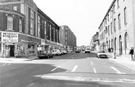 West Street from the junction of Rockingham Lane showing Nos. 95-101, Methodist Book Shop (left) and 112, Job Centre (right)