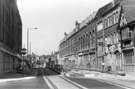 Supertram tracks under construction outside Nos.128, West Street Hotel, 136/8 Sahib Indian Restaurant (formerly John Townroe and Sons, Tiger Works) and 140/144, Hutton's Buildings (formerly Wm.Hutton and Sons, electro platers, West Street