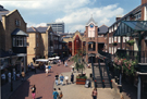 View: s24025 Elevated view of Orchard Square looking towards the Food Court and Church Street showing the clock and the housing for the Grinder and Buffer Automaton