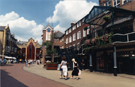 View: s24028 Orchard Square looking towards the Food Court and Church Street showing the clock and the housing for the Grinder and Buffer Automaton