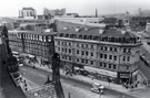 Elevated view from the Town Hall of Nos. 2 - 28 Pinstone Street showing premises including William Timpson Ltd., shoe shop with Barkers Pool extreme right