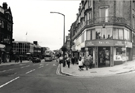 Pinstone Street from the junction with Cross Burgess Street looking towards The Moor showing Laycock House above No. 68, South Yorkshire Passenger Transport Executive, travel shop