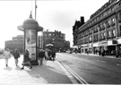 Nos. 30, Somerfields Supermarket; 36, Smiths Cleaners and 38, Beatties of London Ltd., models, toys and games, Pinstone Street looking towards the Prudential Buildings with the Peace Gardens left