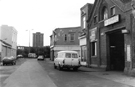 South Yorkshire County Council (SYCC), Cultural Activities Centre including South Yorkshire Archives (left) and No. 34 Mr. Exhaust, exhausts and tyre fitting, Ellin Street with Lansdowne Flats in the background