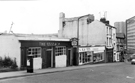 View: s24225 Nos. 45, The Cossack public house; Kayes Furnishers and 57, Howard Hotel, Howard Street looking towards Sheaf House and Claywood Flats