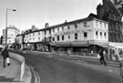Leopold Street looking towards Orchard Street and Abbey National Building Society, Abbey House showing Nos. 57, Shampoo, unisex hairdressers; 55, Three Tuns public house and (right) H. L. Brown and Son Ltd., jewellers, No. 70 Fargate