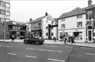 Leopold Street, Orchard Street and the entrance to Orchard Square showing Abbey National Building Society; The Orchard public house (originally The Museum Hotel) and Dash Ltd; 