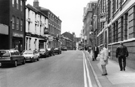 Brownhill Vickers, surveyors, auctioneers and estate agents; 74, Three Cranes public house and Queens Buildings (right), Queen Street looking towards Bank Street