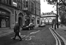 Entrance to Gladstone Buildings; Nos. 5, AA Travel Agency and 2, Eadon Lockwood and Riddle, estate agents, St. James' Row from Church Street