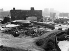 Elevated view from the Town Hall Extension of Surrey Place (formerly Eyre Street) showing the excavations for The Novotel Hotel; Leader House (left); Local Taxation and Licences Office; Owen Building, Hallam University; Arundel Gate and Howar
