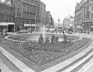View: s24469 Goodwin Fountain, Fargate looking towards High Street showing Nos. 64 Legal and General Assurance Society Ltd., Bank Chambers; 64 - 62 Joan Barrie, ladies fashions and 58 Burnley Building Society