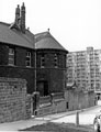 View: s24598 Park Junior and Infant School, Duke Street formerly Park County School showing the Boys entrance, with Park Hill Flats in the background