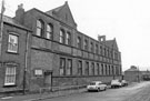 St. Barnabas Church of England School, Cecil Road looking towards the junction with Horner Road and the rear of housing on Herschell Road