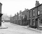 Nos. 6 - 20 Hattersley Street from the corner shop, No. 107 Grammar Street showing the junctions with Gould Street and Poplar Street looking towards Walkley County Infant School, Majuba Street in the background