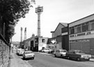 No. 106, Foxon and Robinson Ltd., box makers and J. Gilder and Co., motor dealers, John Street showing the Floodlights from  Bramall Lane Football and Cricket Ground 