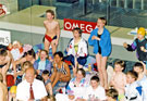 Children cheering their friends on during the opening ceremony at Ponds Forge Sport and Leisure Centre in the run-up to the World Student Games