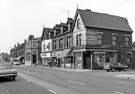 Nos. 169 G. W. Baker and Son, ironmongers and general dealer; 167 - 165 and 163 March the Tailor, Attercliffe Common from the junction with Bradford Street looking towards No. 145, National Westminster Bank after the junction with Rotherham
