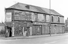From the junction with Kirkbridge Road; Nos. 870 - 872 Attercliffe Sales and Exchange; former premises of E. B. O. Said, cafe Nos. 866 - 868; Ernest B. Giles, optician, Nos. 862 - 864 Attercliffe Road looking towards the junction with Beverley Street