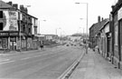Nos. 799 S. Kitters, ladies outfitters, derelict 801 - 805 (left); premises including No. 796 J. Dobson and Son, watchmaker, Attercliffe Road from junction of Vicarage Road (extreme left) looking towards junction with Newhall Road (left)
