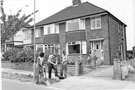 Workmen tidying the grass verges outside Nos. 216, Arnold Avenue, Gleadless with No. 218 right
