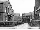 Atkin Place from No. 40 St. Barnabas Road looking towards No. 25 (left) and; Wesley House (former Sunday School of Trinity Methodist Church), Highfield Place with St. Barnabas Church right Atkin Place from No. 40 St. Barnabas Road looking towards No. 25 (left) and; Wesley House (former Sunday School of Trinity Methodist Church), Highfield Place with St. Barnabas Church right