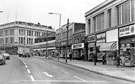 Nos. 590 Marcway Models; 592 R.C. Hopkinson Ltd., grocers; 594 Landers Bread Ltd., grill and coffee bar; 596 Wm. Timpson Ltd; 598 R Westons Chemist Ltd; 602/8 M C Hitchens; Ernest Burgess Ltd. tailors, Attercliffe Road looking towards John Banner Ltd Nos. 590 Marcway Models; 592 R.C. Hopkinson Ltd., grocers; 594 Landers Bread Ltd., grill and coffee bar; 596 Wm. Timpson Ltd; 598 R Westons Chemist Ltd; 602/8 M C Hitchens; Ernest Burgess Ltd. tailors, Attercliffe Road looking towards John Banner Ltd